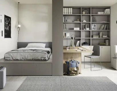 Cameretta componibile con letto su cassettone, scrivania e ampia libreria Next space 02 di Nidi