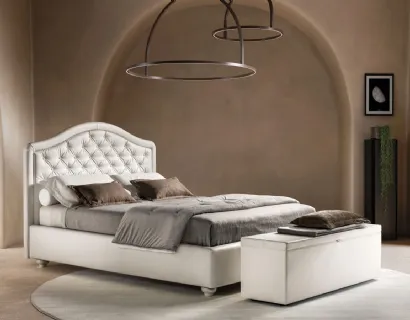 Letto in ecopelle con testiera sagomata e trapuntata Infinity di Bside