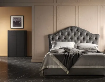 Letto in tessuto lavorazione capitonné con testiera sagomata Queen di Bside