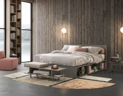 Letto in legno dalle linee essenziali Pongo con testiera e librerie laterali di Oggioni