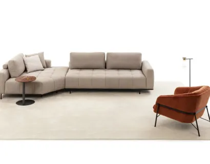 Divano con penisola Cortina Tufted di Nicoline