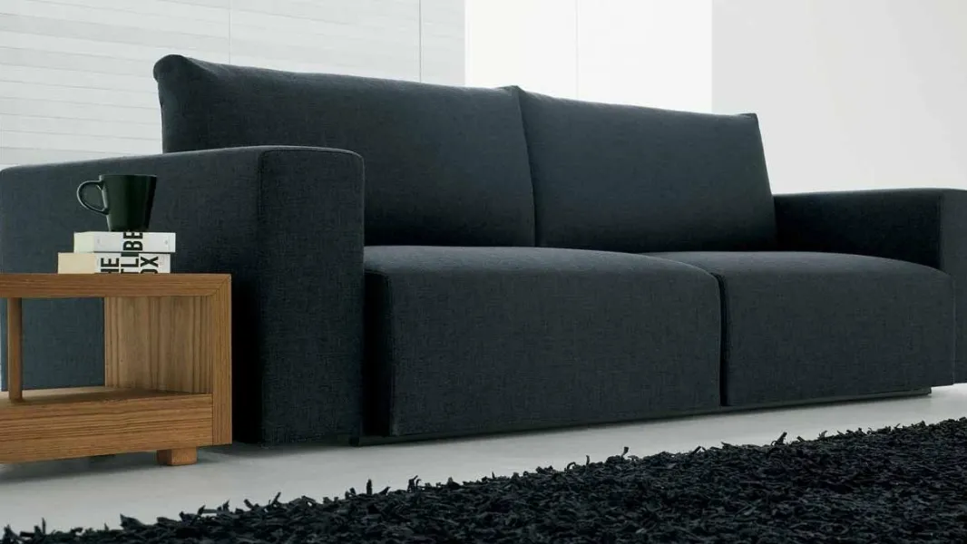Divano relax lineare in tessuto imbottito InOUT con sedute a scorrimento di Deas