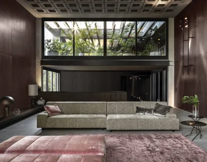 Divano con penisola in tessuto dal design lineare Zara di Nicoline
