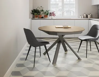 Tavolo rotondo allungabile Twist con top in laminato e gambe in metallo verniciato di Arredo3